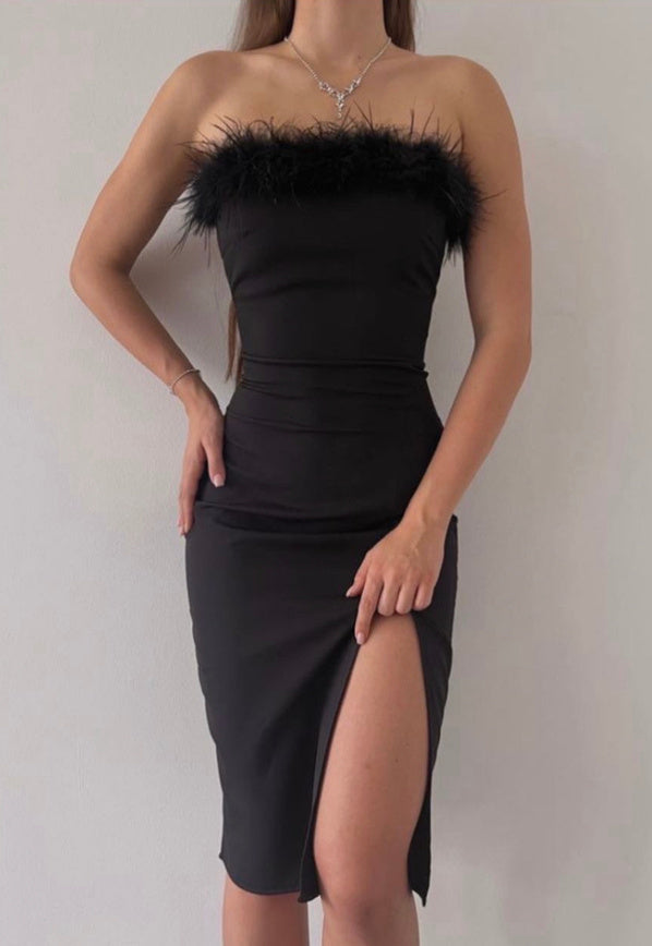 Vestido negro con plumas